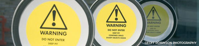 warning label on underground bin